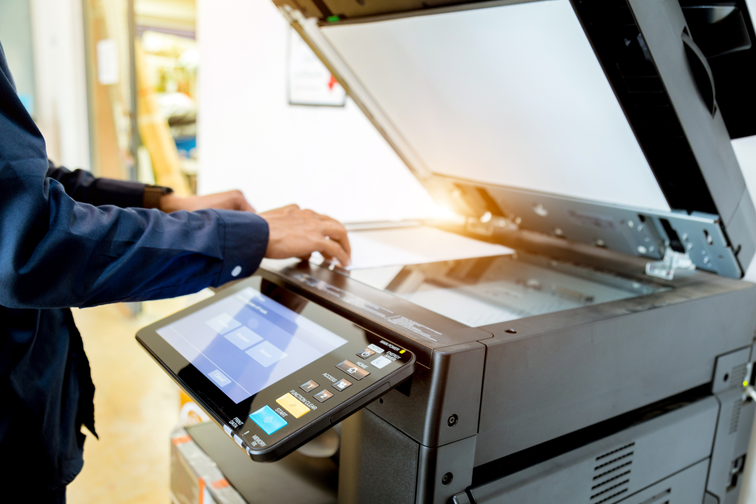 Bussiness man Hand press button on panel of printer, printer sca